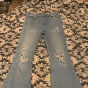 Women's Light Blue Distressed Jeans